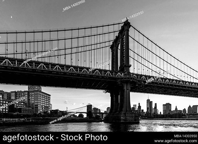 John Street Park, New York City, NY, USA, Brooklyn Bridge over East River in the evening at golden hour