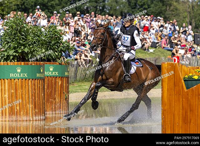 Ingrid KLIMKE (GER) on EQUISTROs Siena just do it, galloping, in the water, action, 28th place in eventing, cross-country C1C: SAP-Cup, on July 2nd, 2022