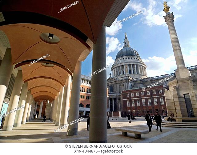 Repeated arches in Paternoster Square right outside the London Stock Exchange with St Pauls Cathedral in the background  Architects are Eric Parry Architects...