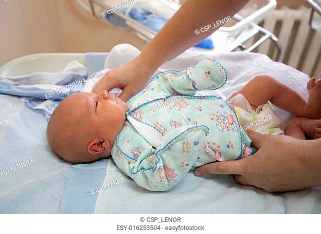 baby at the age of 4 days prepare in an extract from maternity hospital