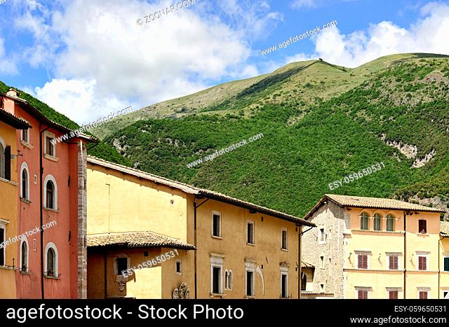Image of houses and green hills in Visso Italy Marche