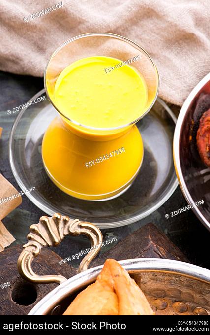 Mango Lassi, yogurt or smoothie. Healthy probiotic Indian popular summer drink