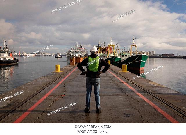 Dock worker standing in the port