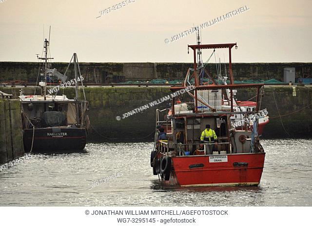 UK SCOTLAND Pittenweem -- 13 Feb 2014 -- A fishing trawler returns to the harbour at Pittenweem in Fife Scotland UK shortly after a deal was announced for...