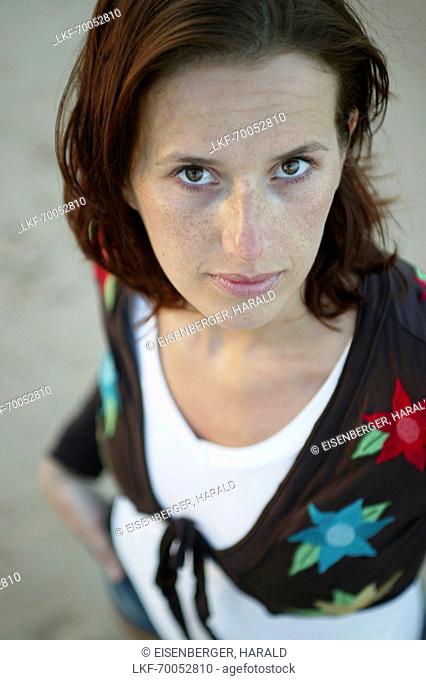Portrait of a young woman, low angle view