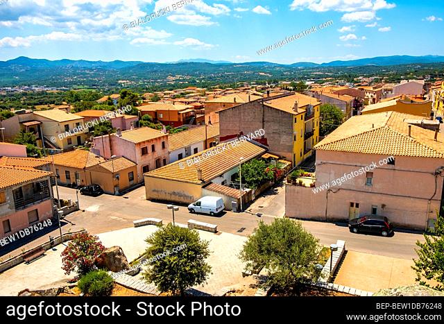 Arzachena, Sardinia / Italy - 2019/07/19: Panoramic view of the town of Arzachena, Sassari region of Sardinia, with surrounding mountains