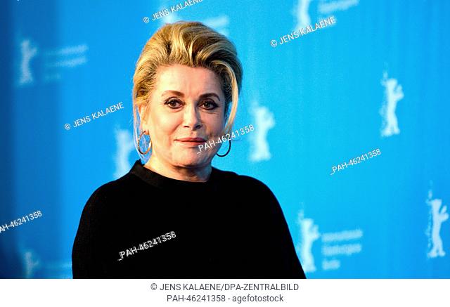 French actress Catherine Deneuve poses during the photocall for 'In the courtyard' (original title: Dans la cour) at the 64th annual Berlin Film Festival in...