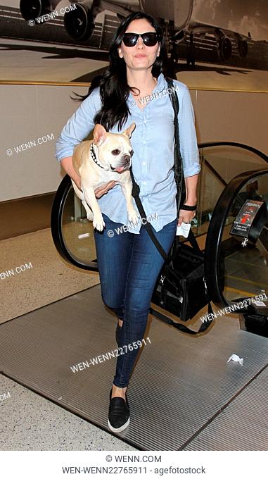 'Vampire Diaries' star Jodi Lyn O'Keefe departs from Los Angeles International Airport (LAX) with her pet dog Featuring: Jodi Lyn O'Keefe Where: Los Angeles