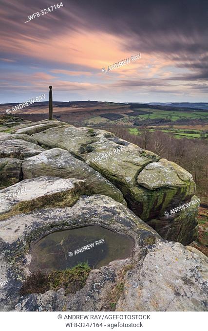 Nelson's Monument on Birchen Edge in the Peak District National Park, captured at sunset in late March. A long exposure was utilised to blur the movement in the...