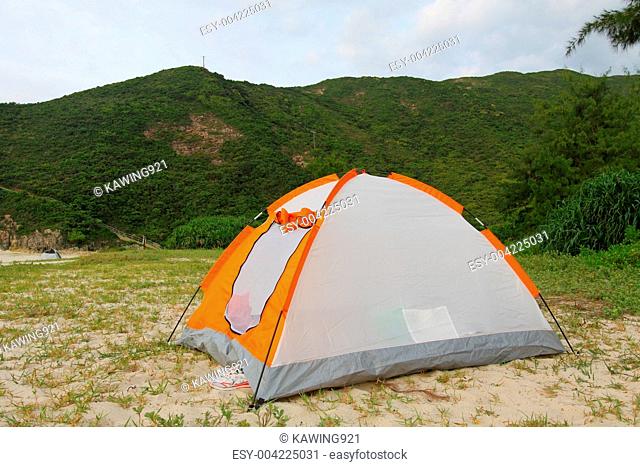 Wild camping on beach with tent