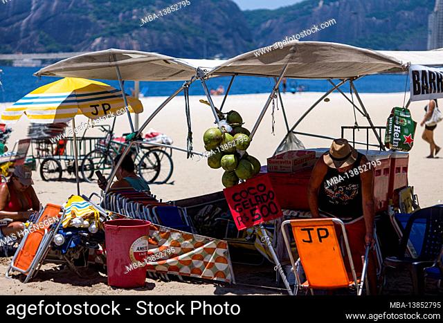 Happy Shopping from beach venors at Paria do Flamengo Beach on a sunny summer day in Rio de Janeiro, Brazil. Shot with leica m10