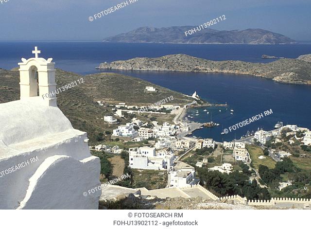 Greece, Ios, Greek Islands, Cyclades, Ormos, Europe, Scenic view of Ormos harbor from a whitewashed church in Hora on Ios Island on the Aegean Sea