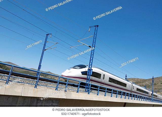 view of a high-speed train crossing a viaduct in Bubierca, Saragossa, Aragon, Spain, AVE Madrid Barcelona