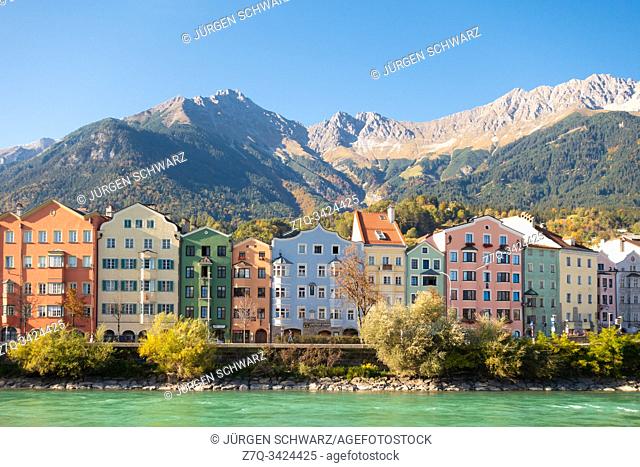 View on coloured houses of Mariahilf at the Inn in front of the Nordkette, Innsbruck, Tyrol, Austria