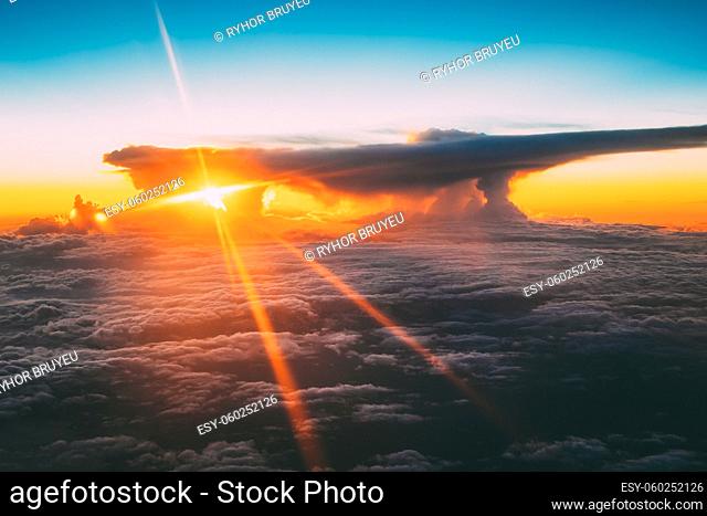 Sunset Sunrise Over Mountains From Height Of Airplane, Plane. Bright Blue, Orange, Yellow And Blue Colors Of Sunrise Sky Background