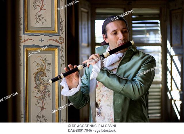 Flute player, court life in the Stupinigi hunting lodge, Italy, 18th century. Historical re-enactment
