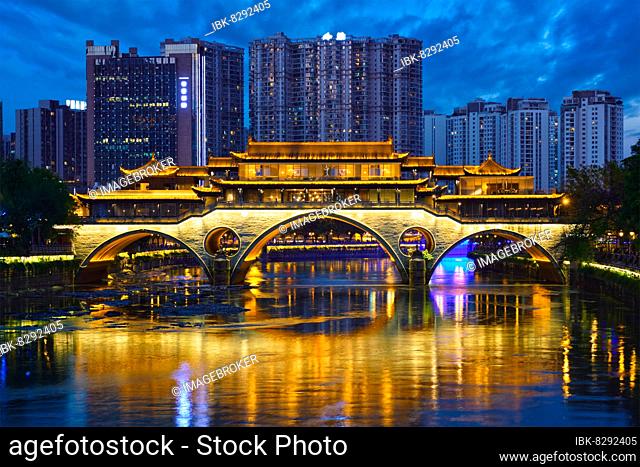 Famous landmark of Chengdue, Anshun bridge over Jin River illuminated at night, Chengdue, Sichuan, China, Asia
