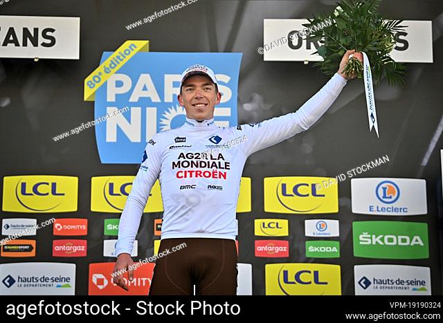 Belgian Stan Dewulf of AG2R Citroen celebrates on the podium in the white jersey for best young rider after the second stage of 80th edition of the Paris-Nice...