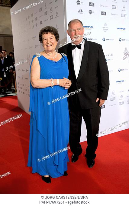 Dagmar (L) and Tigran Schipanski arrive for the Felix Burda Award 2014 ceremony at Hotel Adlon in Berlin, Germany, 6 April 2014