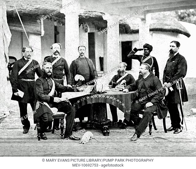 Major General Sir Henry Tombs VC KCB (1825-1874) (seated, left), British army officer, with members of his staff and a dog, in India