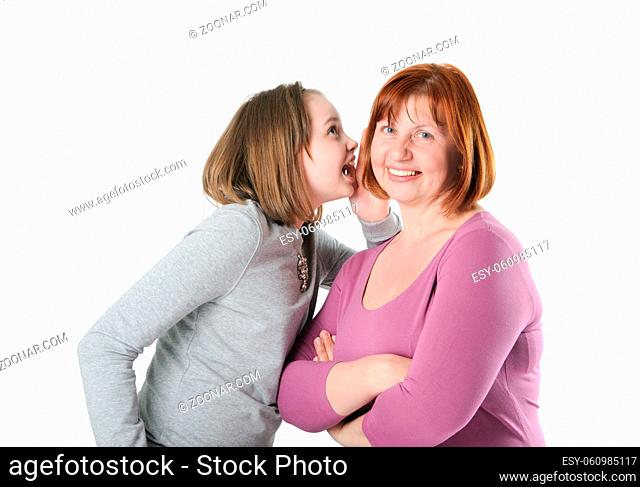 Girl teenager emotionally something tells her mother's ear