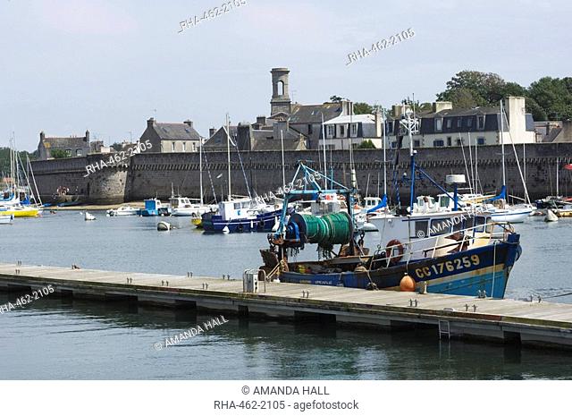 The old walled town of Concarneau seen from the fishing harbour, Southern Finistere, Brittany, France, Europe