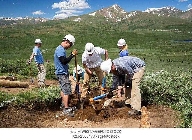 Georgetown, Colorado - Volunteers maintain the Mt. Bierstadt Trail in the Mt. Evans Wilderness Area. They installed logs (waterbars) across the trail to stop...