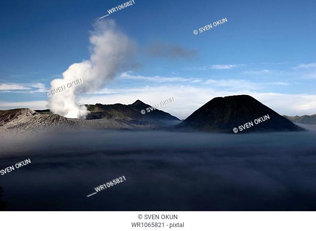 Active crater of Mount Bromo left and Mount Batok right, Bromo Tengger Semeru National Park, Island of Java, Indonesia