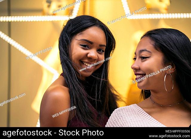 Portrait of two happy attractive young women