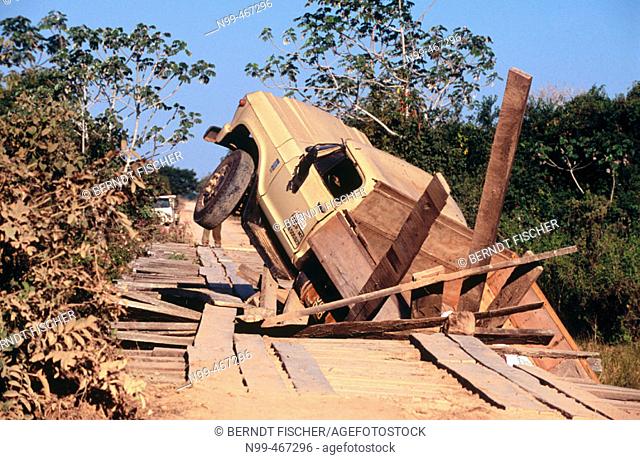 Broken bridge. Accident with a lorry on the Pantaneira road. Pantanal near Porto Joffre. Mato Grosso. Brazil
