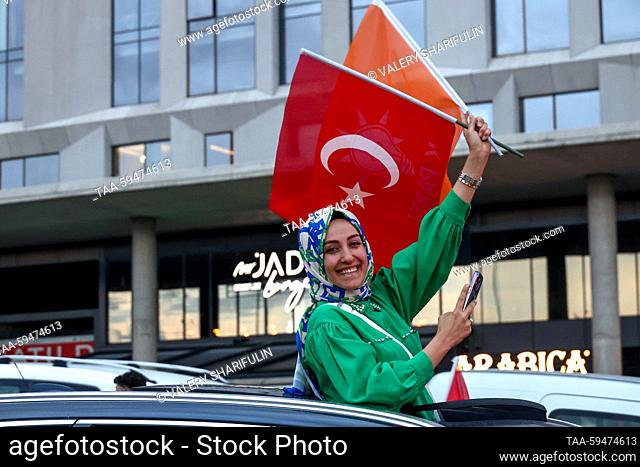 RUSSIA, ANKARA - MAY 28, 2023: A supporter of incumbent president Recep Tayyip Erdogan rallies in front of the Presidential Palace duringa runoff between...