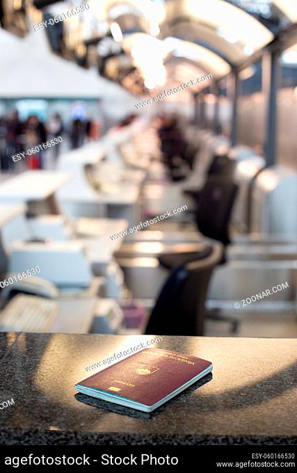 Slovenian passport vaiting for inspection on airport bording crossing check.Travel concept