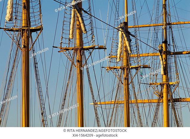 Close up of mastils and sails at dawn. Blue sky background. Burrard pier at North Vancouver, British Columbia in Canada