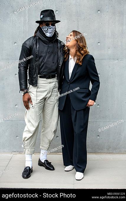 American football player Cam Newton and Italian PR Roberta Armani guests at the Emporio Armani fashion show on the third day of Milan Fashion Week Women’s...