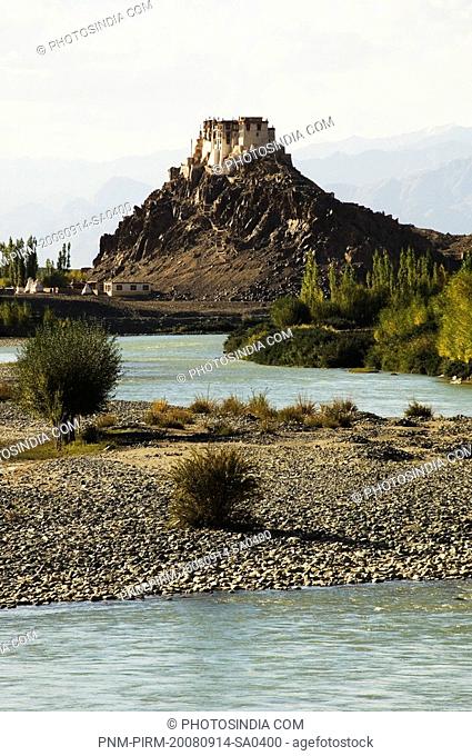 River with monastery in the background, Stakna Monastery, Indus River, Ladakh, Jammu and Kashmir, India