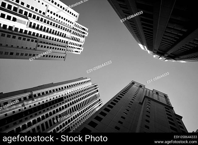 Many-storeyed apartment buildings. Black and white architectural photography