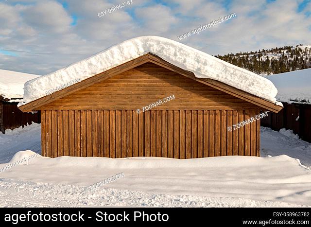Snow on a garage roof in Brokke, Setesdal in Norway. Winter