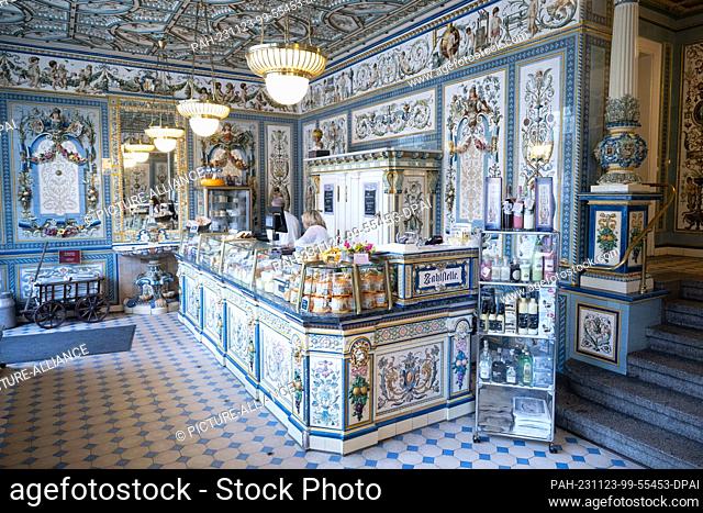 23 November 2023, Saxony, Dresden: The cheese counter in the listed sales room of ""Pfunds Molkerei"". The attraction of the dairy store is the 247 square...