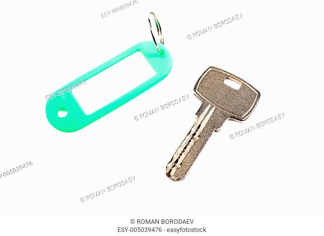 Key and green trinket with empty for your design space isolated