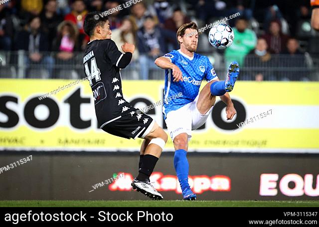 Charleroi's Ryota Morioka and Genk's Patrik Hrosovsky fight for the ball during a soccer match between Sporting Charleroi and KRC Genk