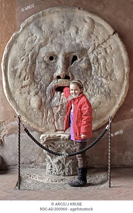 Girl, La Bocca della Verita, Mouth of Truth, Roman church of Santa Maria, Cosmedin, Rome, Lazio, Italy