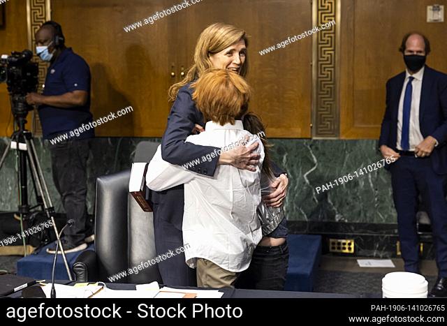 Former US Ambassador to the United Nations Samantha Power hugs her son, Declan Power Sunstein, after she testified before the Senate Foreign Relations Committee...