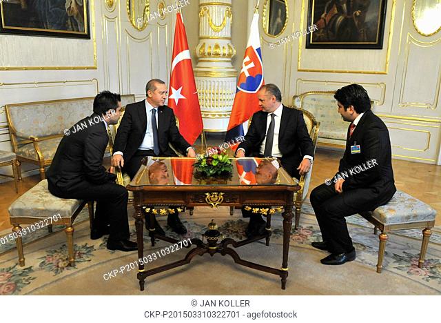 Slovak President Andrej Kiska, 2nd right, welcomes his Turkish counterpart Recep Tayyip Erdogan, 2nd left, during their meeting in Bratislava, Slovakia