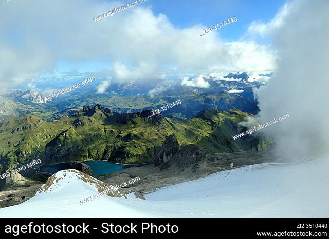 The view from Punta Rocca (3309 mts.), one of the summits of he Marmolada, the higest mountain of the Dolomites. They are a mountain range declared a UNESCO...