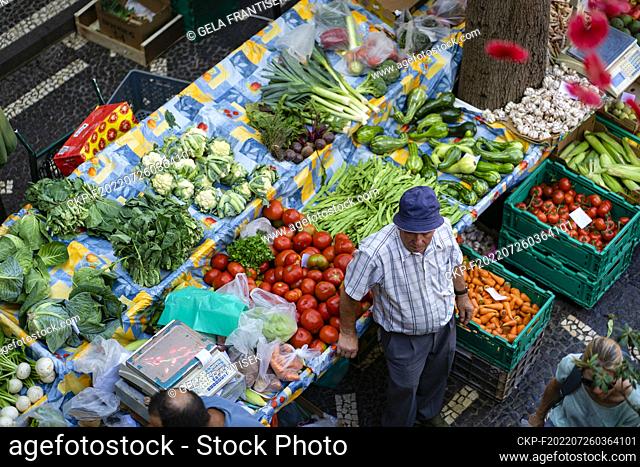 Fruits and vegetables (lettuces, spinach, tomatoes, cauliflower, beans etc.) at the farmer’s market (Mercado dos Lavradores) in Funchal on the Portugese island...