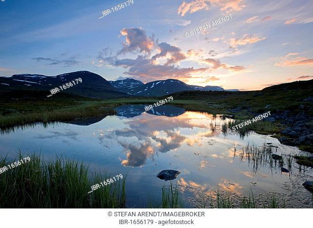 Midnight sun in the Fjaell Mountains with a small mountain lake, Kungsleden, The King's Trail, Lapland, Sweden, Europe