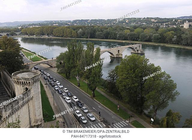 The Rhone, the biggest river of France, flows past Avignon, France, 1 October 2016. A medieval bridge, which is sung abvout in the song 'Sur le pont d'Avignon'...