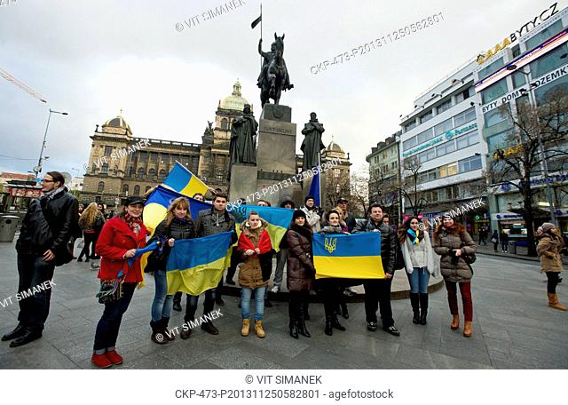 A group of about twenty Ukrainians, living in Czech Republic, protest against the Ukrainian government's decision to pause integration with the European Union