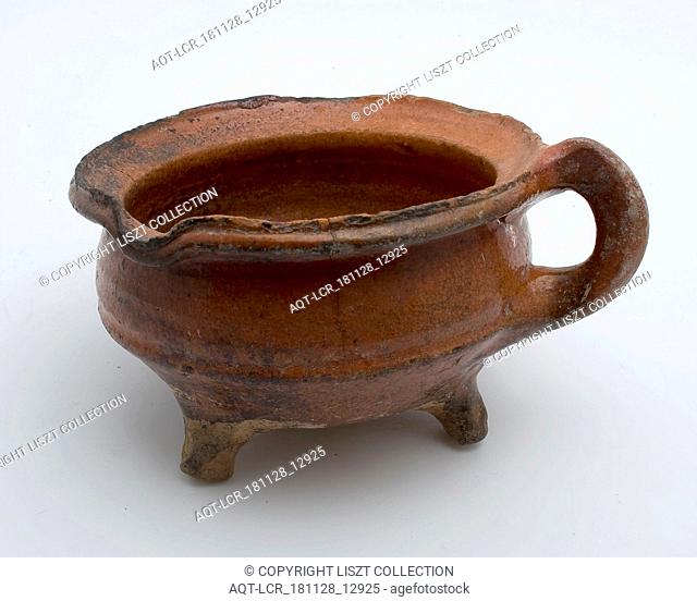 Pottery cooking jug, grape-model, red shard with lead glaze, vertical band-ear, on three legs, cooking jug be found in the earthenware ceramics earthenware...