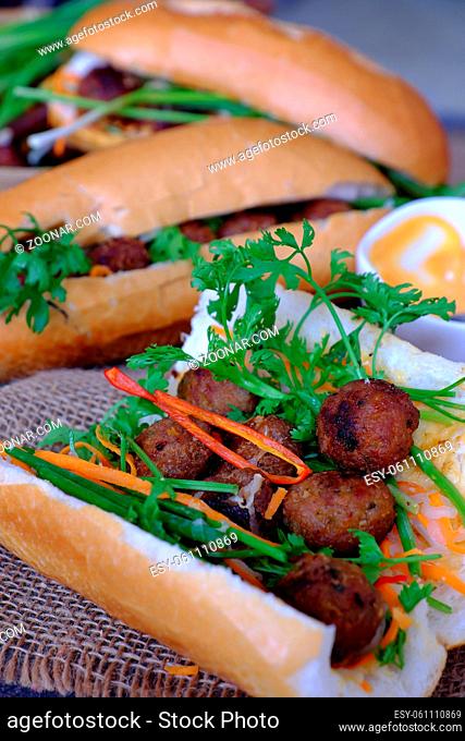 Vietnamese street food, banh mi thit nuong or Vietnam bread from grilled meat, this is popular eating and special culture in Viet Nam cuisine